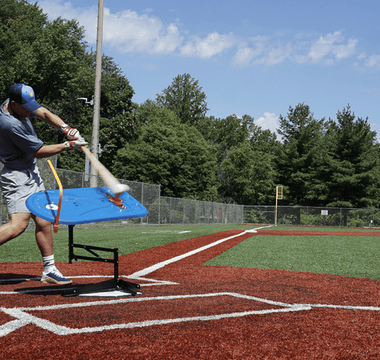 baseball player at bat practicing baseball hitting drills