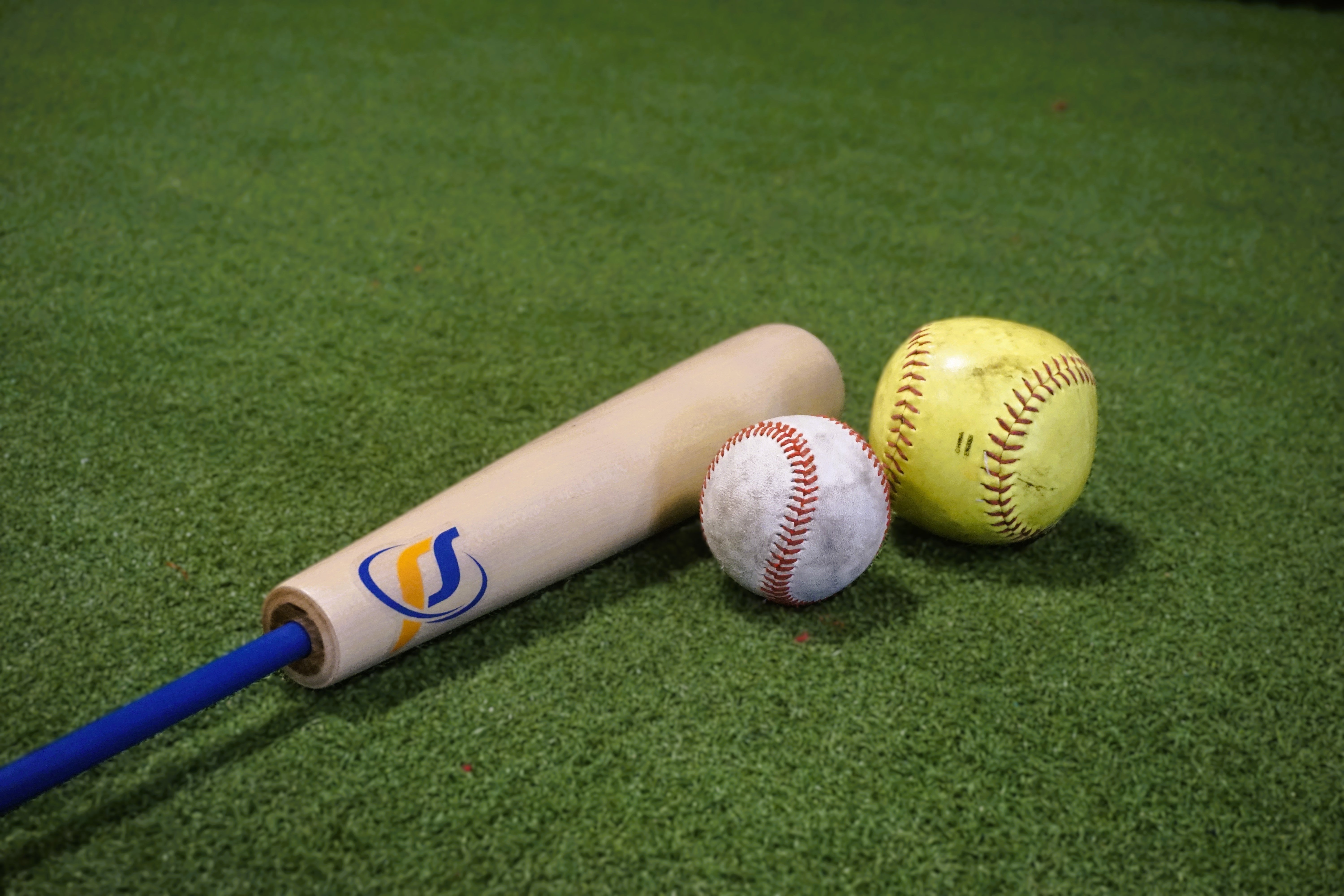 lag bat with a baseball and softball
