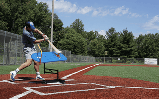baseball player at bat practicing baseball hitting drills