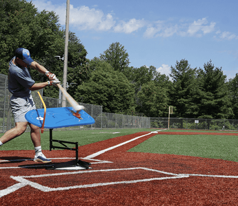 baseball player at bat practicing baseball hitting drills